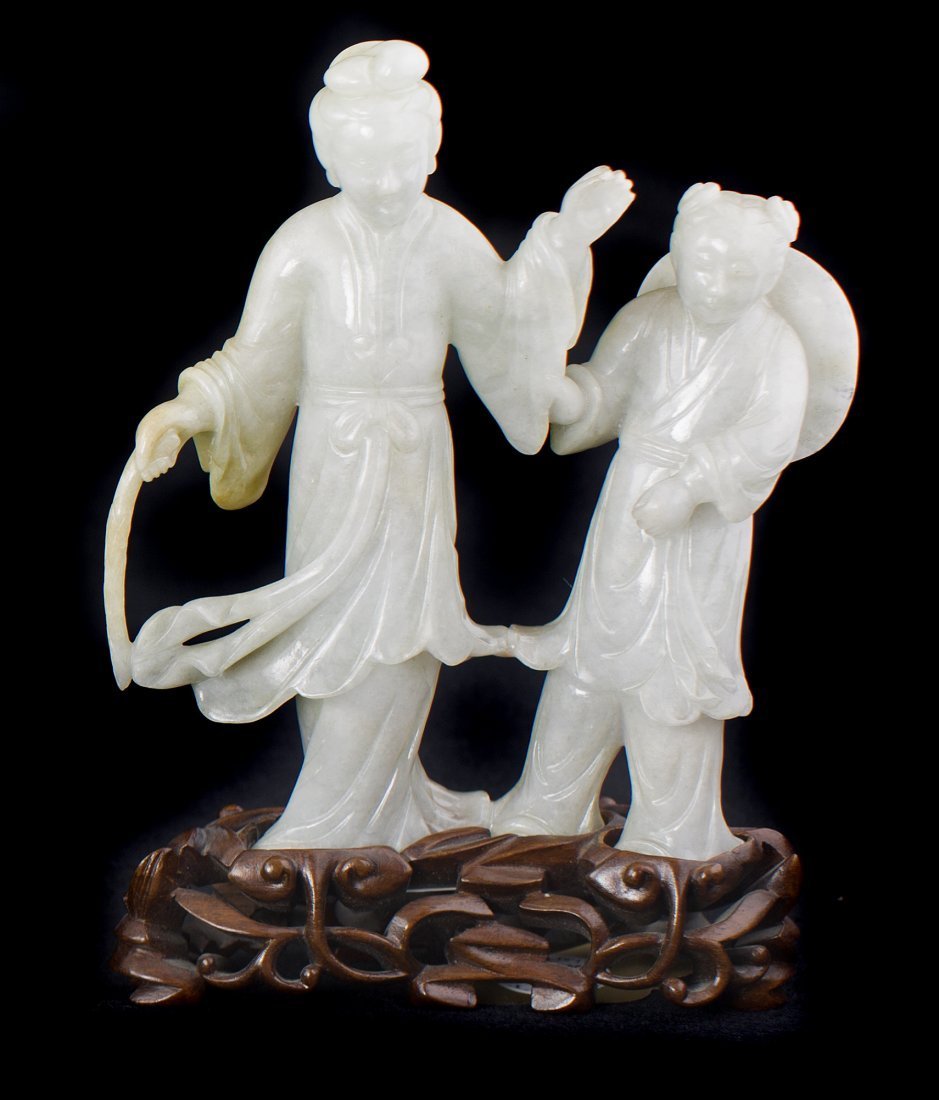 A LIGHT LAVENDER JADE FIGURE OF A GUAN YIN AND CHILD (1 of 1)