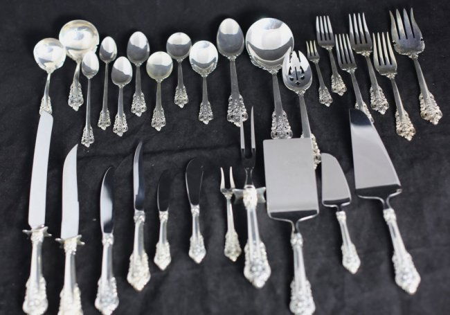 251 PIECE GRAND BAROQUE SILVER FLATWARE SET: 251 PIECE GRAND BAROQUE SILVER FLATWARE SET. Introduced in 1941, Maker: Wallace Silversmiths. Comprising: 20 Steak knives 19 forks 20 Seafood forks 20 Soup spoons 20 Bouillon spoons 20 Coffee / Tea sp