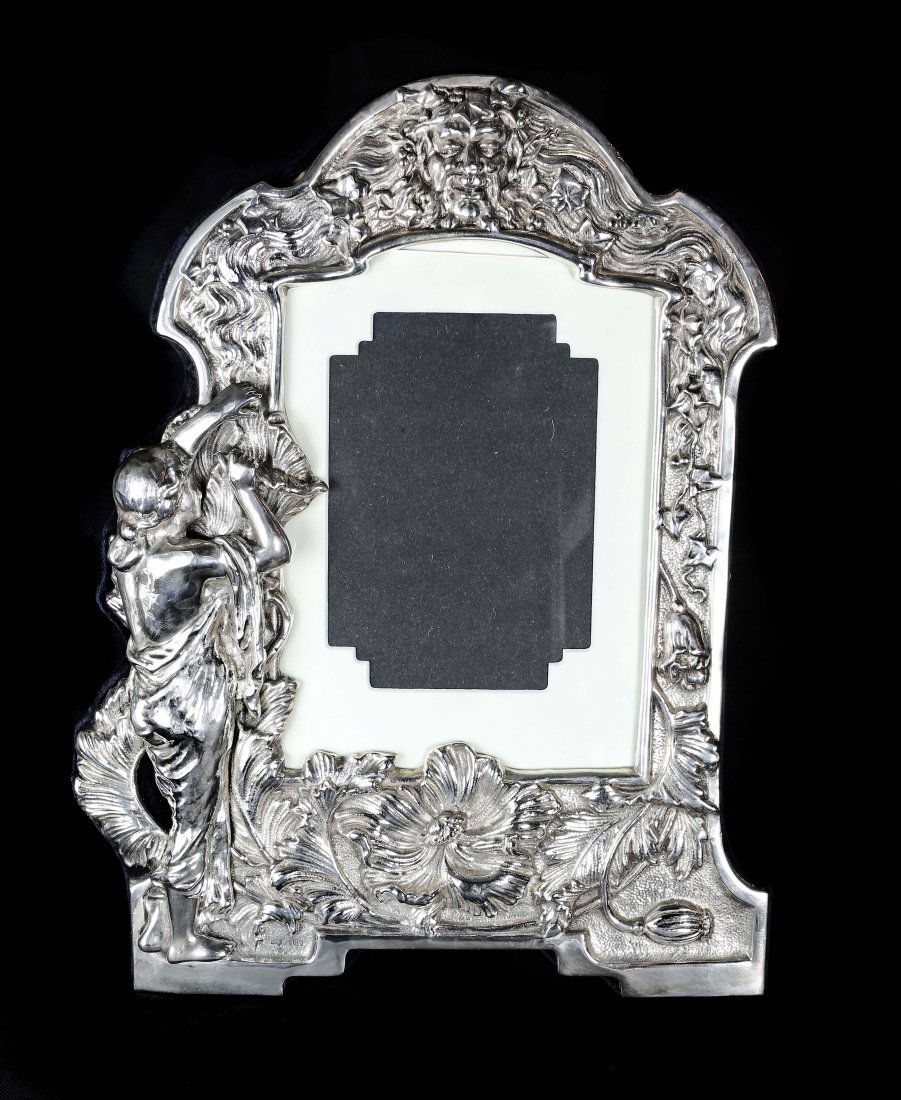 A LARGE SILVER PICTURE FRAME (1 of 1)