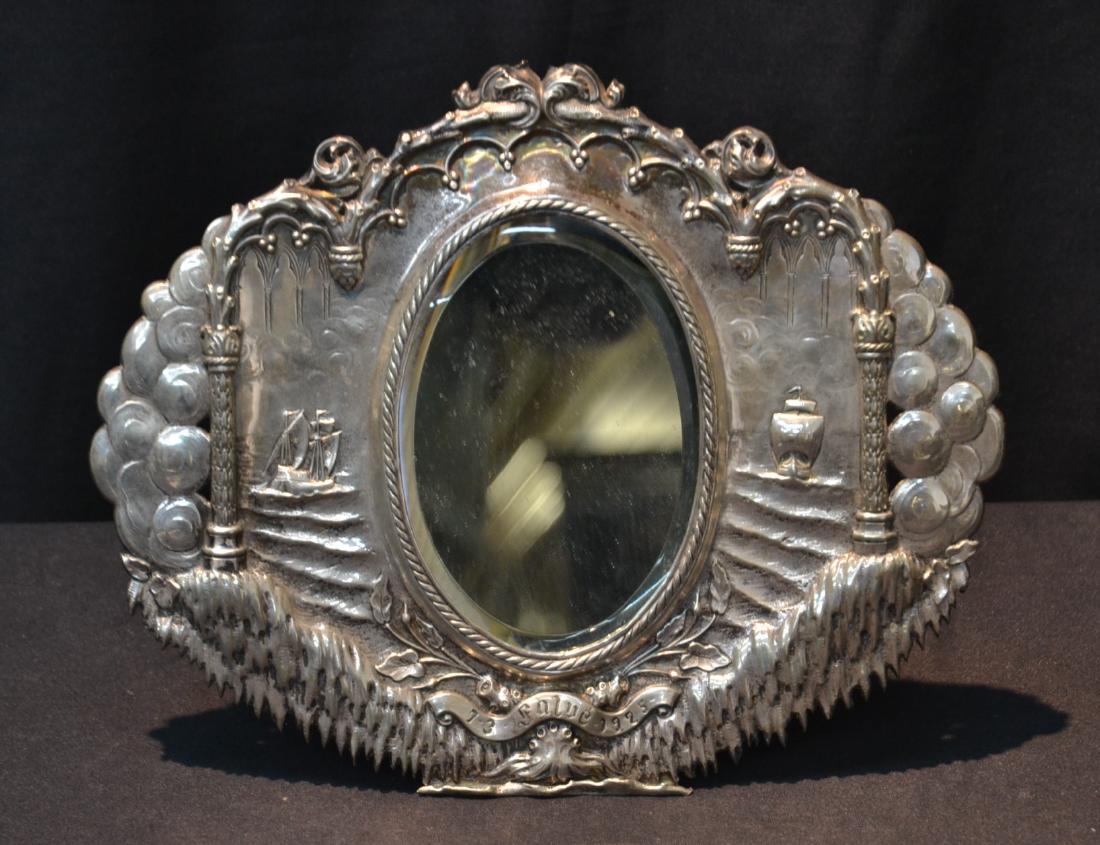 EMBOSSED SILVER MIRROR WITH SHIPS ON HIGH SEAS: & INSCRIPTION DATED 1925 - 11" x 9"