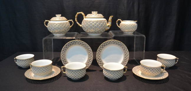 SEVRES REPUBLIQUE FRANCAIS DOUBLE-WALLED: CHINOIS RETICULE" , EPOQUE NAPOLEON III ; TEA SERVICE CONSISTING OF TEA POT , SUGAR, CREAMER , (4) SAUCERS & (6) CUPS ; STAMPED RF (REPUBLIC FRANCAIS), DORE A SEVRES , MANUFACTURE NATIONALE , 1914 ; W