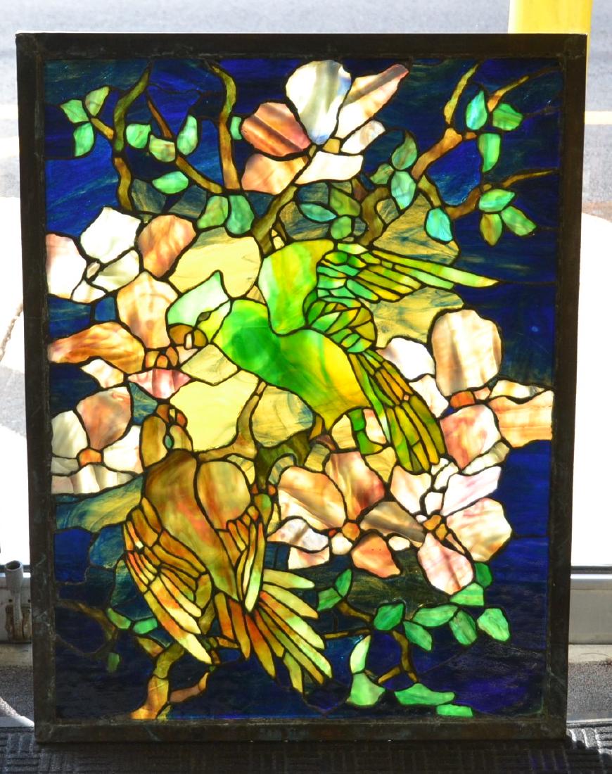 MULTI COLOR STAINED LEADED GLASS WINDOW: PANEL DEPCITING PARROTS PERCHED AMONGST HIBISCUS ; SIGNED TIFFANY STUDIOS , NEW YORK ; - 33" x 25" OVERALL ; SAME PANEL IN ALISTAIR DUNCAN MASTERWORKS OF LOUIS COMFORT TIFFANY (FEW CRACKED PANELS) (PL