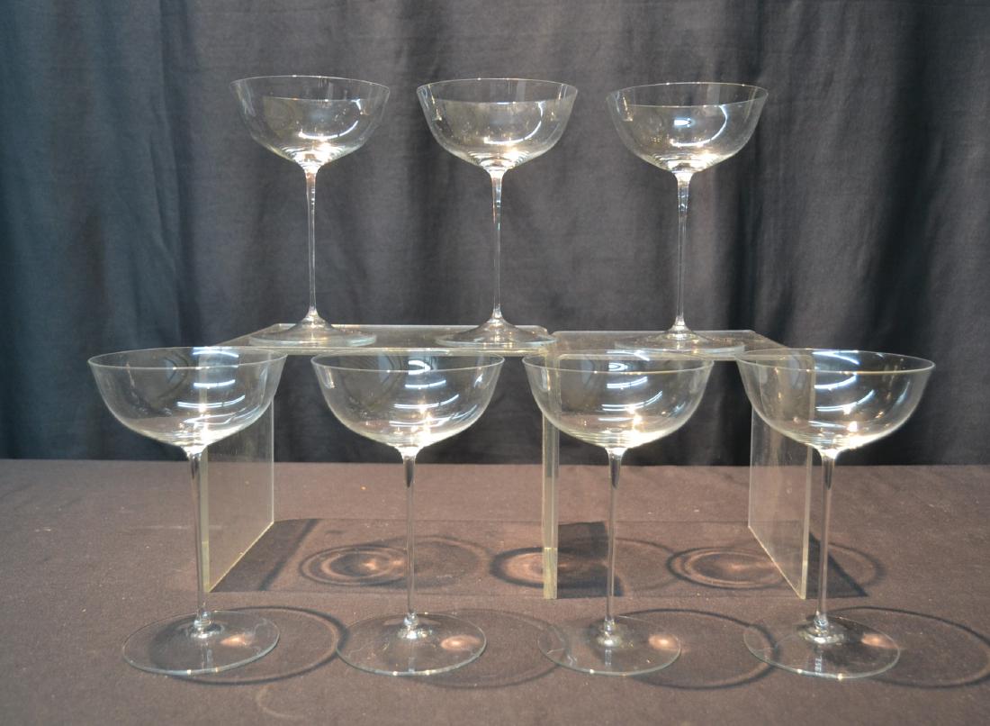(7) JOSEF HOFFMAN "PATRICIAN" CHAMPAGNE STEMWARE: Josef Hoffman (1870-1956) was a designer of the Austrian Wiener Werkstatte school whose very thin stemmed glasses were originally designed as "Patrician" stemware in 1907 for Lobmeyr. Muslin glass is