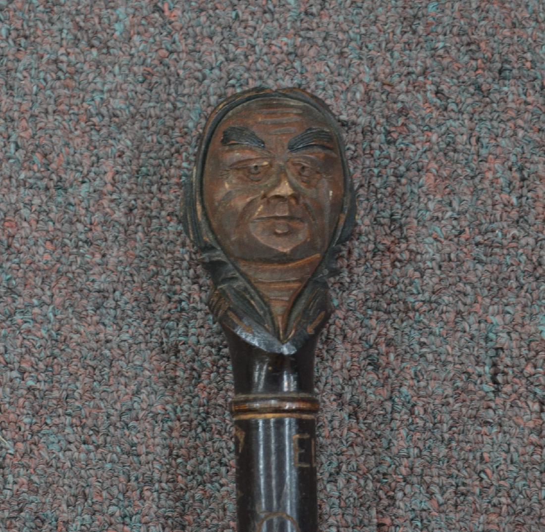 ANTIQUE HAND CARVED WOOD CANE WITH CARVED: BUST OF JOHN R. HERMANN , WITH NAMES CARVED IN THROUGHOUT CANE - 35" LONG