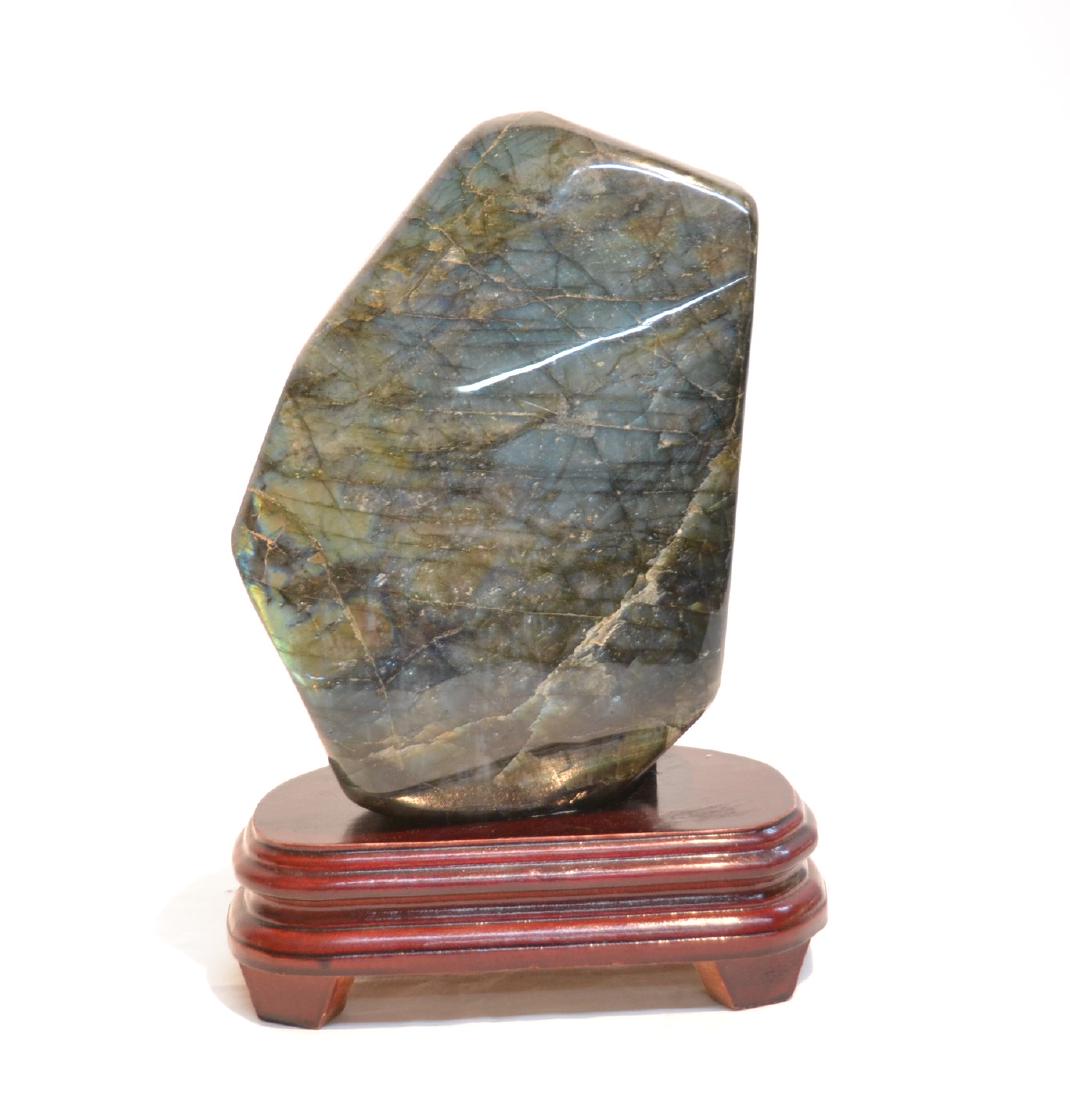 IRIDESCENT LABRADORITE SCHOLAR STONE: WOODEN STAND - 6" x 3 1/2" x 10" ; UNMARKED