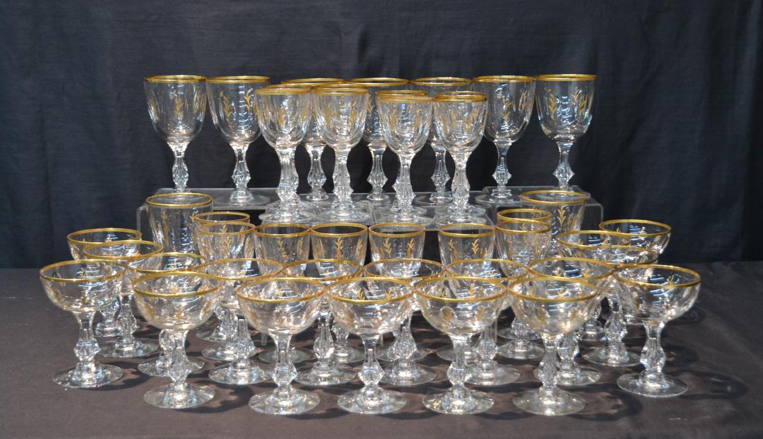 BACCARAT ? GOLD DECORATED STEMWARE GLASSES: (43) UNSIGNED BACCARAT ? GOLD DECORATED STEMWARE GLASSES - (9) LARGE WINE GLASSES, (16) WINE & (18) CHAMPAGNE GLASSES - 3 1/2" x 7"