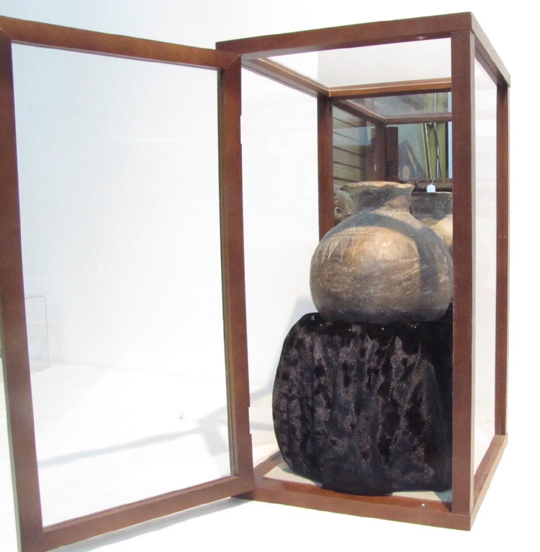 PRE COLUMBIAN , INCA POTTERY VESSEL: FROM NORTHERN EQUADOR , IN DISPLAY CASE - 19" x 10" x 10" ; VASE IS 7 1/2" x 7 1/2"