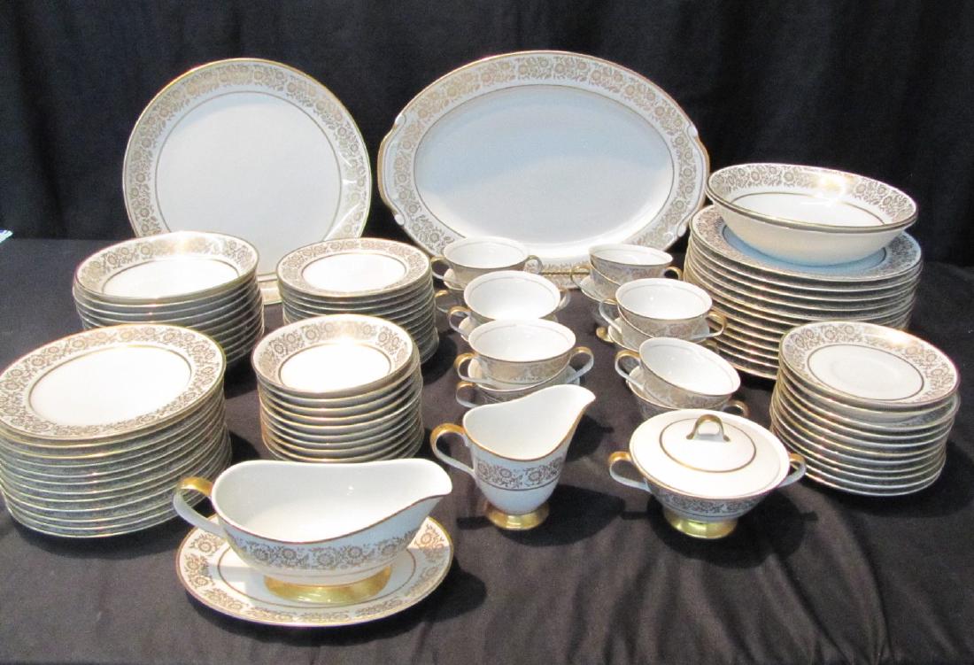 AMCREST "MARSEILLES" CHINA SET: CONSISTING OF (12) DINNER PLATES (ONE CHIP) , (11) SOUP BOWLS, (12) DESSERT , (12) BREAD, (12) BERRY BOWLS, (11) SAUCERS , (17) TEA CUPS (ONE CHIP) , LARGE PLATTER - 16" x 21", 12" SERVING PLATTER , (