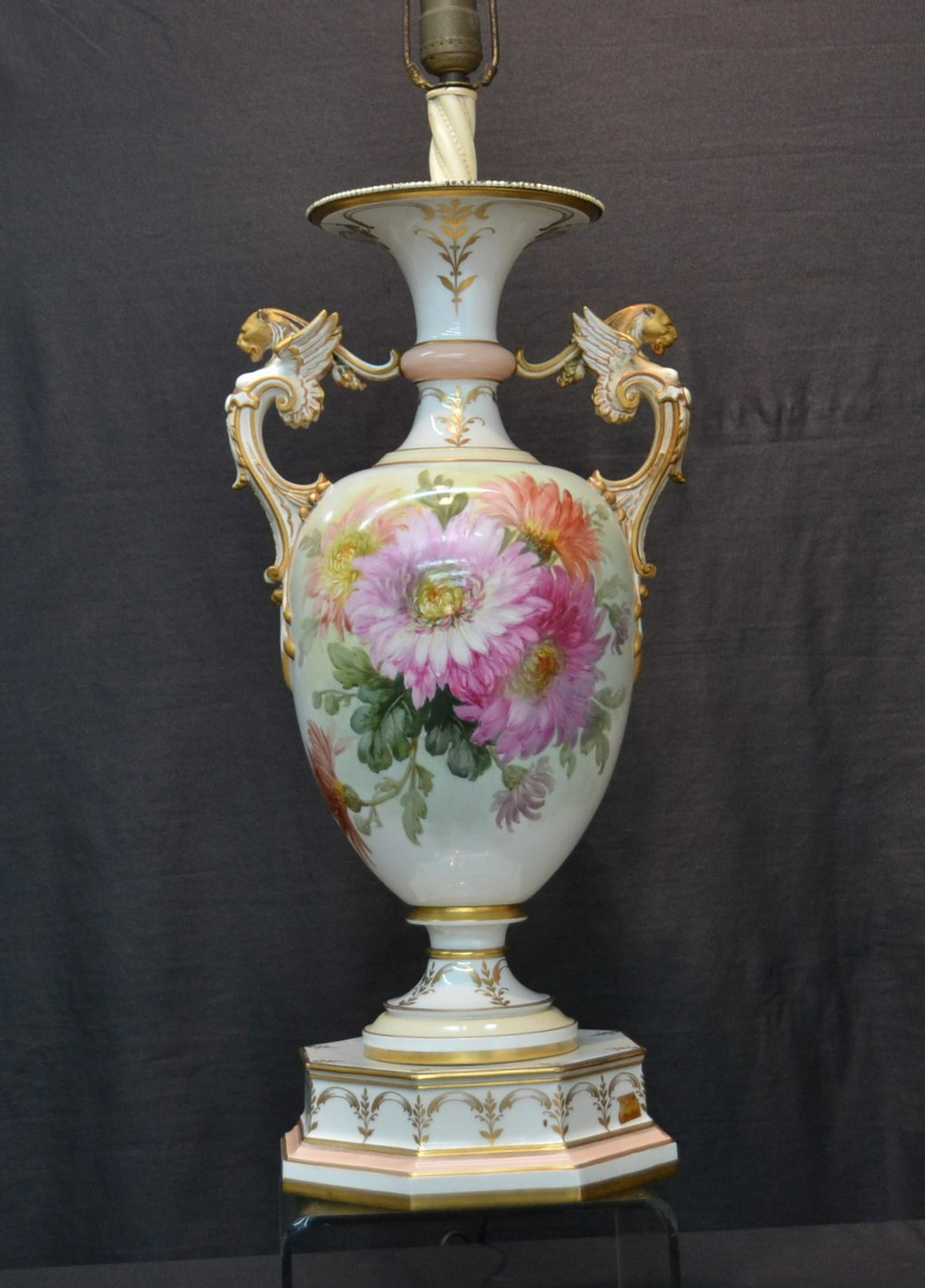 LARGE BERLIN - KPM PORCELAIN URN LAMP: LARGE HAND PAINTED BERLIN - KPM PORCELAIN TWIN HANDLE URN LAMP WITH LARGE FLOWERS & WINGED CARYATID HANDLES , ON PORCELAIN PEDESTAL BASE - URN IS 10" x 21" ; 36" TALL OVERALL (SMALL FLAKE ON RIM & ONE