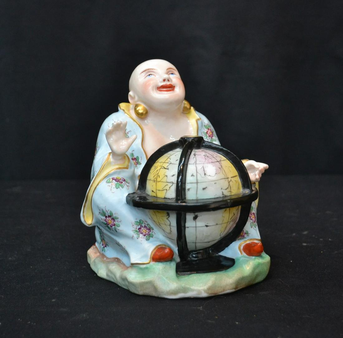 MEISSEN - DRESDEN ? PORCELAIN BUDDHA HOLDING GLOBE: GERMAN PORCELAIN SEATED BUDDHA HOLDING GLOBE , WITH DOUBLE CROSSED SWORDS , WITH JP , INCISED B56 - 6 1/2" x 6 1/2" x 7"