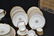 LS & S LIMOGES DINNER SET WITH GOLD DECORATIONS - 8