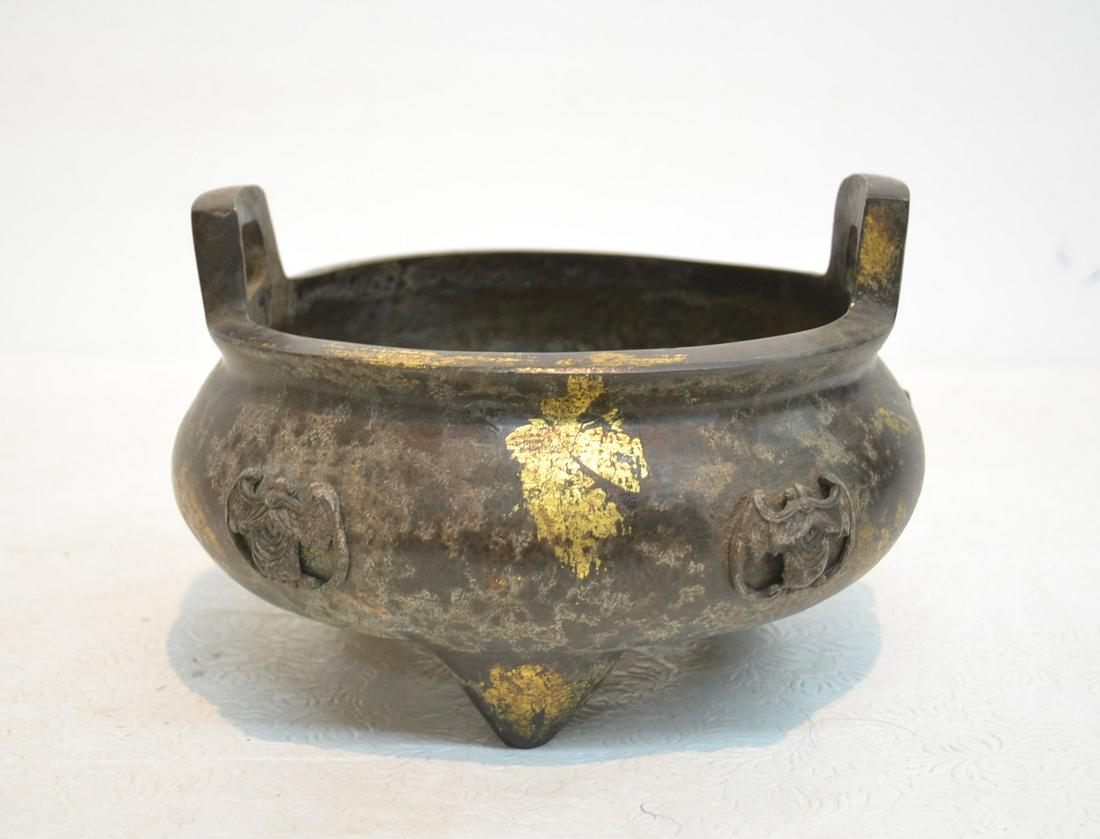 CHINESE BRONZE TRIPOD CENSOR BOWL: CHINESE BRONZE TWIN HANDLE TRIPOD CENSOR WITH BATS & GILDED ACCENTS - 11" x 6"