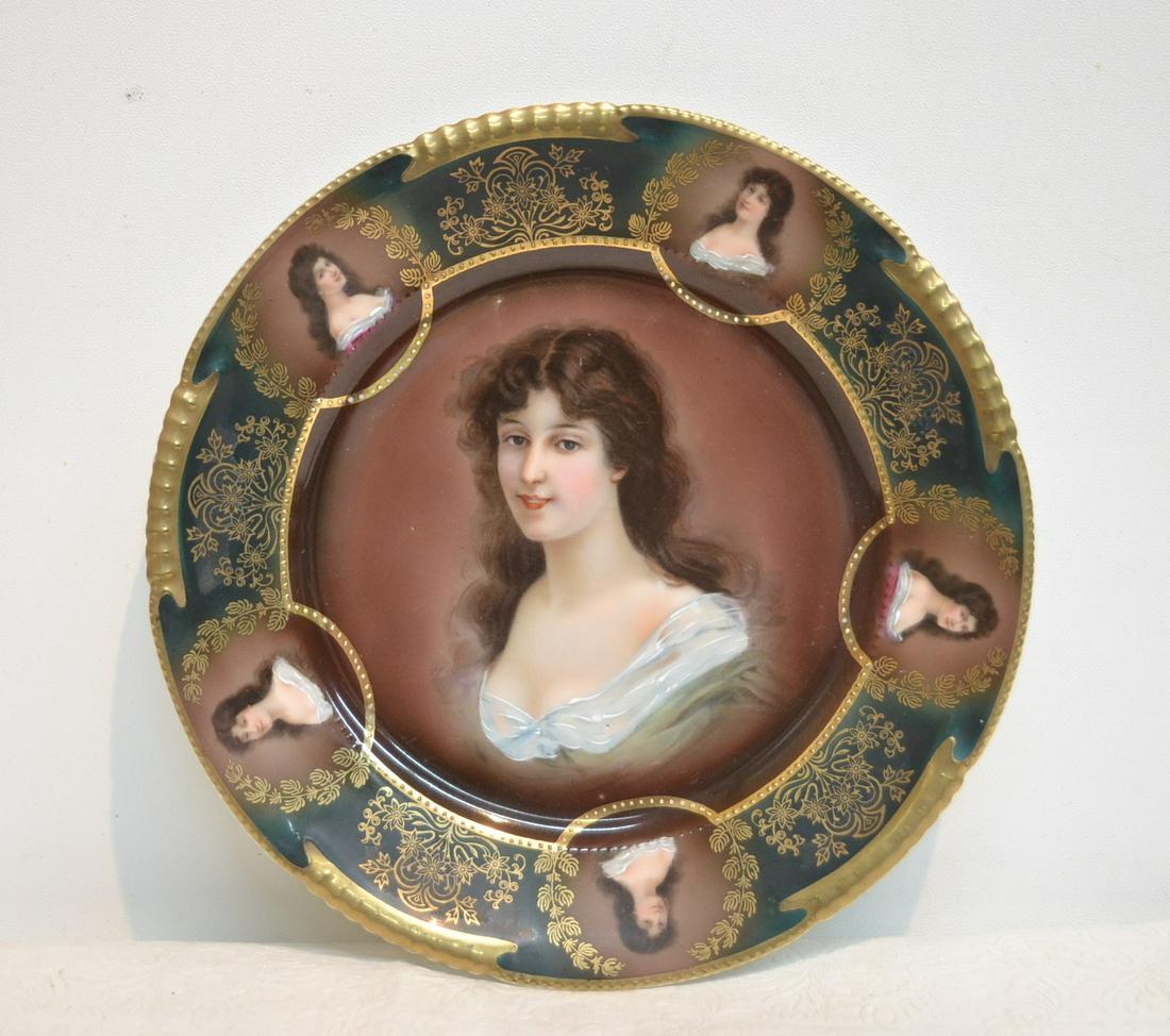 BAVARIAN PORCELAIN PORTRAIT PLATE: PORTRAIT OF WOMAN WITH FLOWING BLACK HAIR & PORTRAITS AROUND BORDER - 9 1/2" D