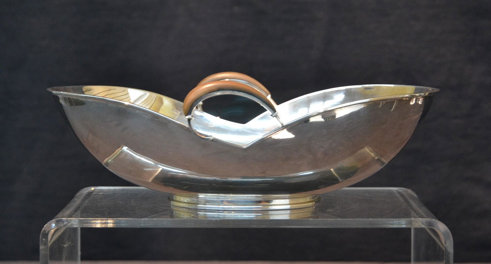 ANTON MICHELSON , DANISH SILVER CENTERPIECE BOWL: ANTON MICHELSON , MODERNIST SILVER CENTERPIECE BOWL WITH EBONY HANDLES , MARKED A. MICHELSON DENMARK - 17.4ozt ; 10" x 7" x 3"