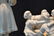 (4) BISQUE PORCELAIN FIGURES OF - 7