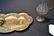 GILT METAL & CHAMPLEVE CONDIMENT SET - 7
