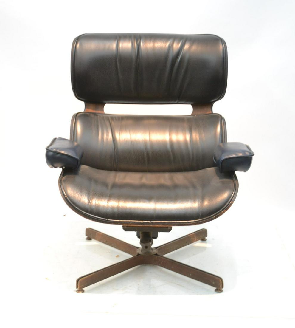 PLYCRAFT MR LOUNGE CHAIR: EAMES STYLE PLYCRAFT MR CHAIR COMPANY LOUNGE CHAIR ; George Mulhauser for Plycraft, with tags under chair with Black vinyl upholstery - 32" X 25" X 38" (some scratching & vinyl arms replaced)