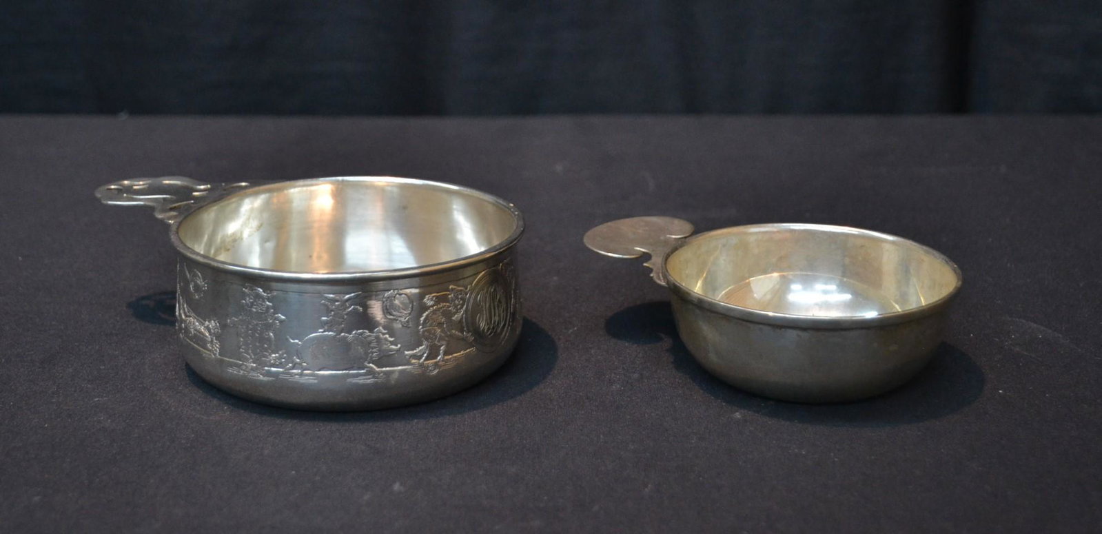 (2) ANTIQUE SILVER PORRINGERS INCLUDING: BLACK , STARR & FROST STERLING SILVER PORRINGER WITH ENGRAVED CIRCUS ANIMALS & 800 SILVER PORRINGER - 8.54ozt - LARGEST IS 3" x 9 1/2"