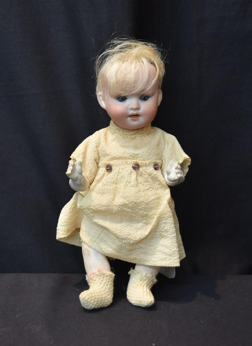 914 GERMAN BISQUE CHARACTER BABY DOLL: GERMAN BISQUE CHARACTER DOLL WITH BLUE SLEEP EYES ; MARKED 914 ; 5/0 - HEAD IS 6 1/2" CIRC ; 9" TALL OVERALL
