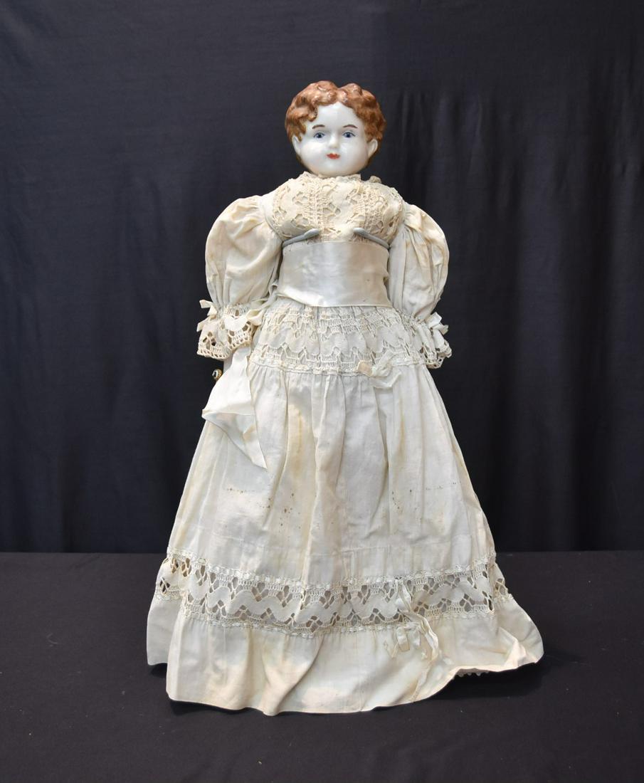 23" CHINA HEAD DOLL: CHINA HEAD DOLL WITH BROWN HAIR & PINK BOOTS - 23" TALL