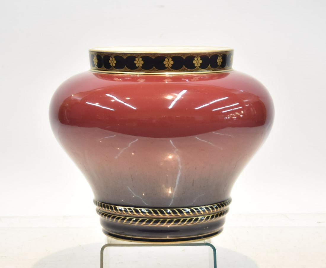 LARGE KPM PORCELAIN JARDINIERE: KPM , BERLIN PORCELAIN JARDINIERE WITH FLAMBE - OXBLOOD GLAZE WITH GOLD DECORATED RIM & BOTTOM ; HAS KPM BERLIN SCEPTOR MARK - 15" x 14"