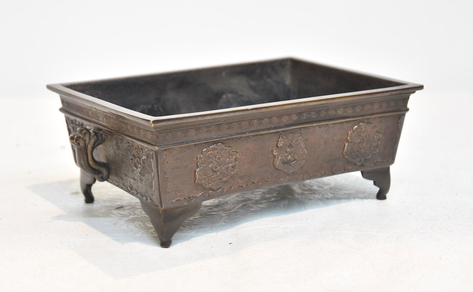 MEIJI PERIOD BRONZE PLANTER: MEIJI PERIOD BRONZE PLANTER WITH TWIN HANDLES, SIGNED - 9 1/2" x 6" x 3"