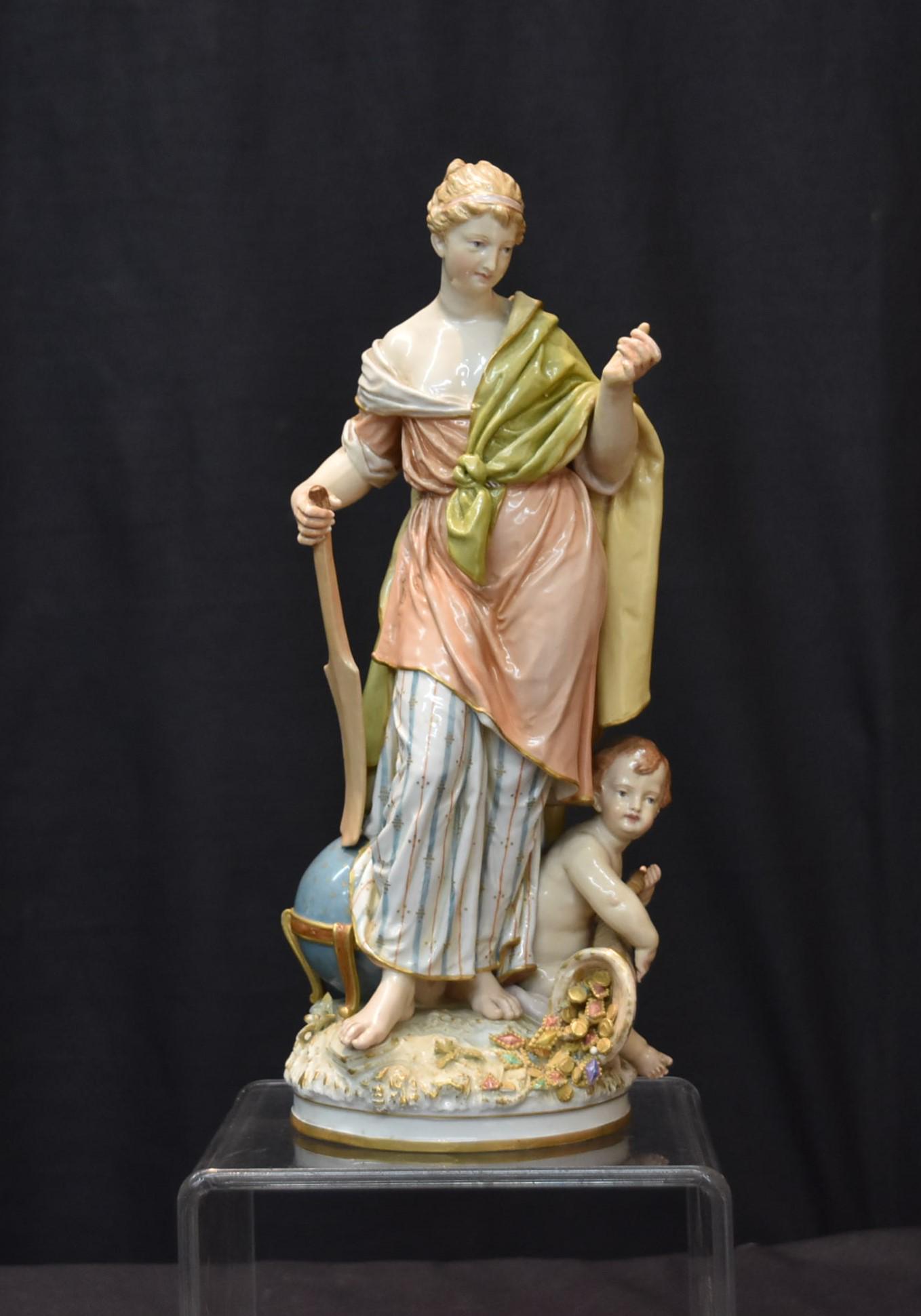 KPM PORCELAIN FIGURE OF WOMAN & PUTTI GROUPING: WITH CORNACOPIA & GLOBE - 3 3/4" x 9 3/4" (SOME RESTORATION TO HER HAND)