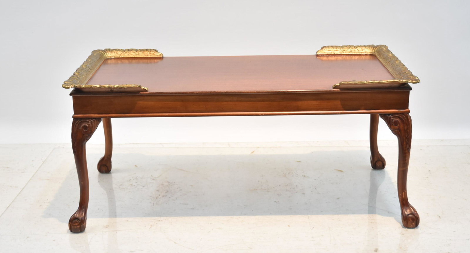 MAHOGANY BALL & CLAW FOOT COFFEE TABLE WITH: GOLD ACCENTS - 38" x 22" x 17"