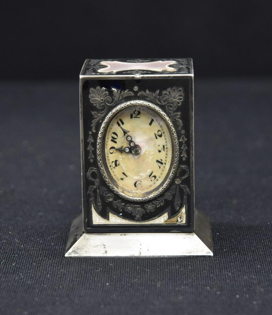 GUBELIN SWISS 935 SILVER & ENAMEL MINIATURE CLOCK: GUBELIN JTC , SWISS 935 STERLING SILVER & GUILLOCHE ENAMEL MINIATURE CLOCK , MARKED 935 ARGENT , JTC - 2" x 1 1/4" x 2 3/4" (SOME LOSS)