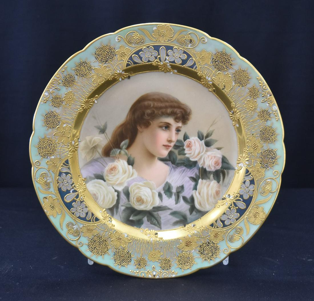 CARL THIEME DRESDEN PORTRAIT PLATE: HAND PAINTED CARL THIEME PORTRAIT PLATE OF YOUNG WOMAN SURROUNDED BY FLOWERS & HEAVY GOLD TRIM , TITLED "AROUND THE ROSES" , ARTIST SIGNED WAGNER - 9 3/4" D