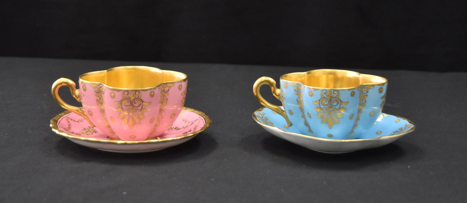 (2) COALPORT PORCELAIN CUPS & SAUCERS: (2) COALPORT PORCELAIN SCALLOPED CUPS & SAUCERS WITH GOLD INTERIOR (ONE SAUCER IS ROYAL WORCESTER) 5 1/2" x 2 1/2"