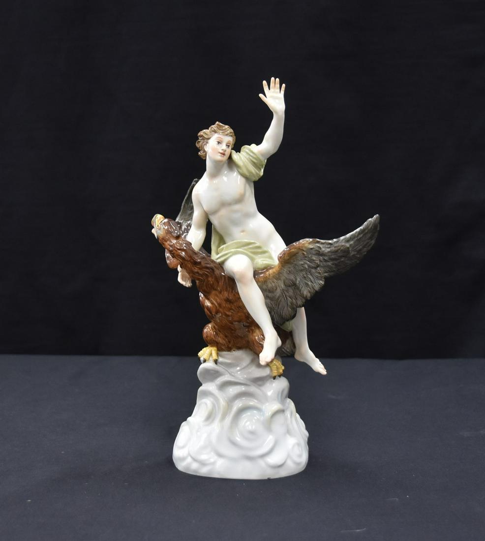 MYTHOLOGICAL MEISSEN FIGURE OF "THE ROBBERY: OF GANYMEDE "Ganymede and Jupiter, depicting the draped Ganymede astride Jupiter disguised as an eagle, raised on a cloud form base, having crossed swords in underglaze blue, further incised 530 and i