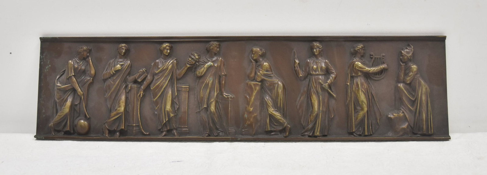 BRONZE CLASSICAL FIGURE RELEIF PLAQUE: BRONZE PLAQUE OF (8) RAISED RELEIF NEO CLASSICAL FIGURES - 20" x 5"
