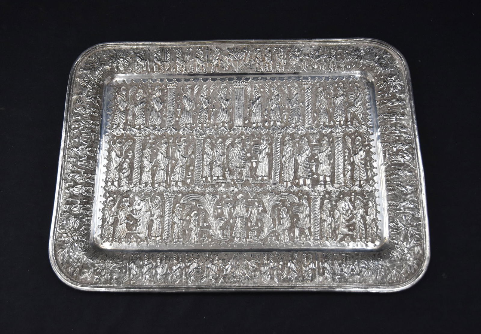 PERSIAN SILVER SERVING TRAY WITH FIGURES & ANIMALS: FINE PERSIAN SILVER TRAY WITH RAISED RELEIF FIGURES OF PERSIAN PERSEPOLIS ACHAEMENID GHALAMZANI WINE TRIBUTE WITH FIGURES & ANIMALS , SIGNED INVERSO ; 15" x 11" ; 36ozt ; 1119.73grams