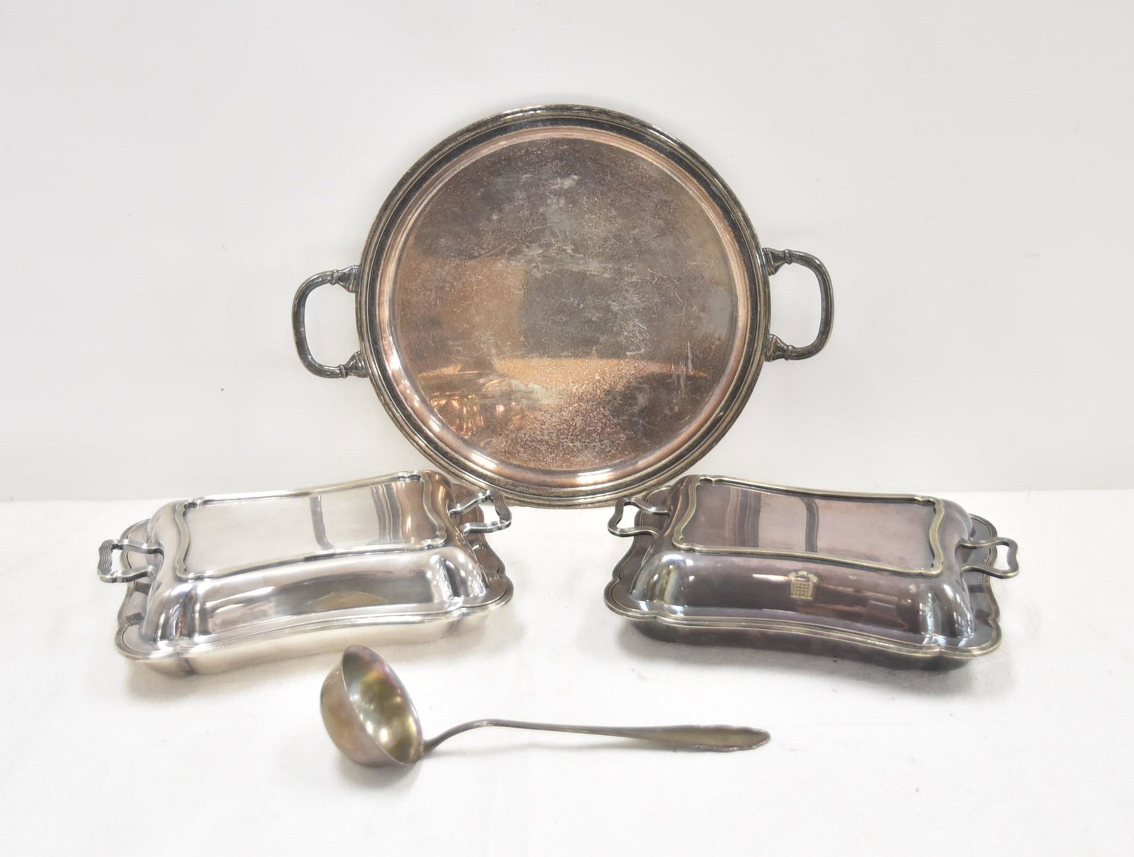 (4)pc SILVER PLATE LOT CONSISTING OF: (2) WILLIAM HUTTON & SONS SHEFFIELD COVERED VEGETABLE , SILVER PLATE TWIN HANDLE TRAY & SILVER PLATE LADEL - LARGEST PIECE IS 9" x 12 1/2 x 3"