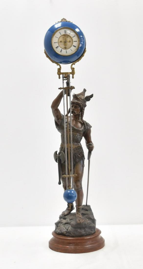 LARGE ANTIQUE SPELTER SWING ARM CLOCK: LARGE GEORGES OMERTH (FRENCH active 18951-1925) ANTIQUE PATINATED SPELTER SCULPTURE OF A VIKING HOLDING BREVETE A PARIS FRENCH SWING ARM CLOCK WITH ENAMEL DIAL & OPEN ESCAPEMENT , BASE SIGNED G. OMERT