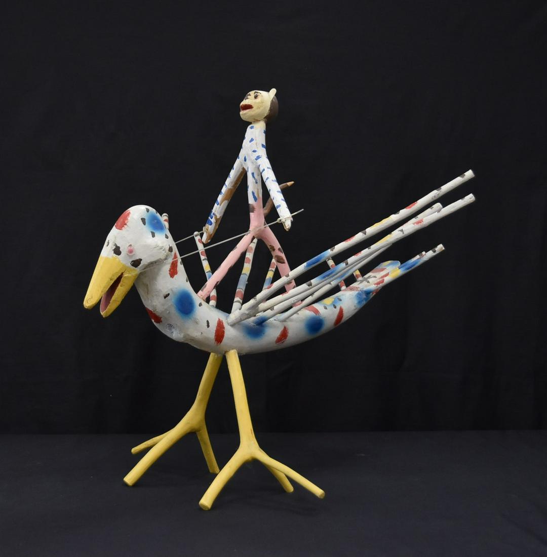 ED LAMBDIN , WOOD CARVING OF MONKEY ON BIRD: ED LAMBDIN FOLK ART WOOD CARVING OF MONKEY RIDING ON BIRD , SIGNED EDD LAMBDIN - 24" x 27" x 23"