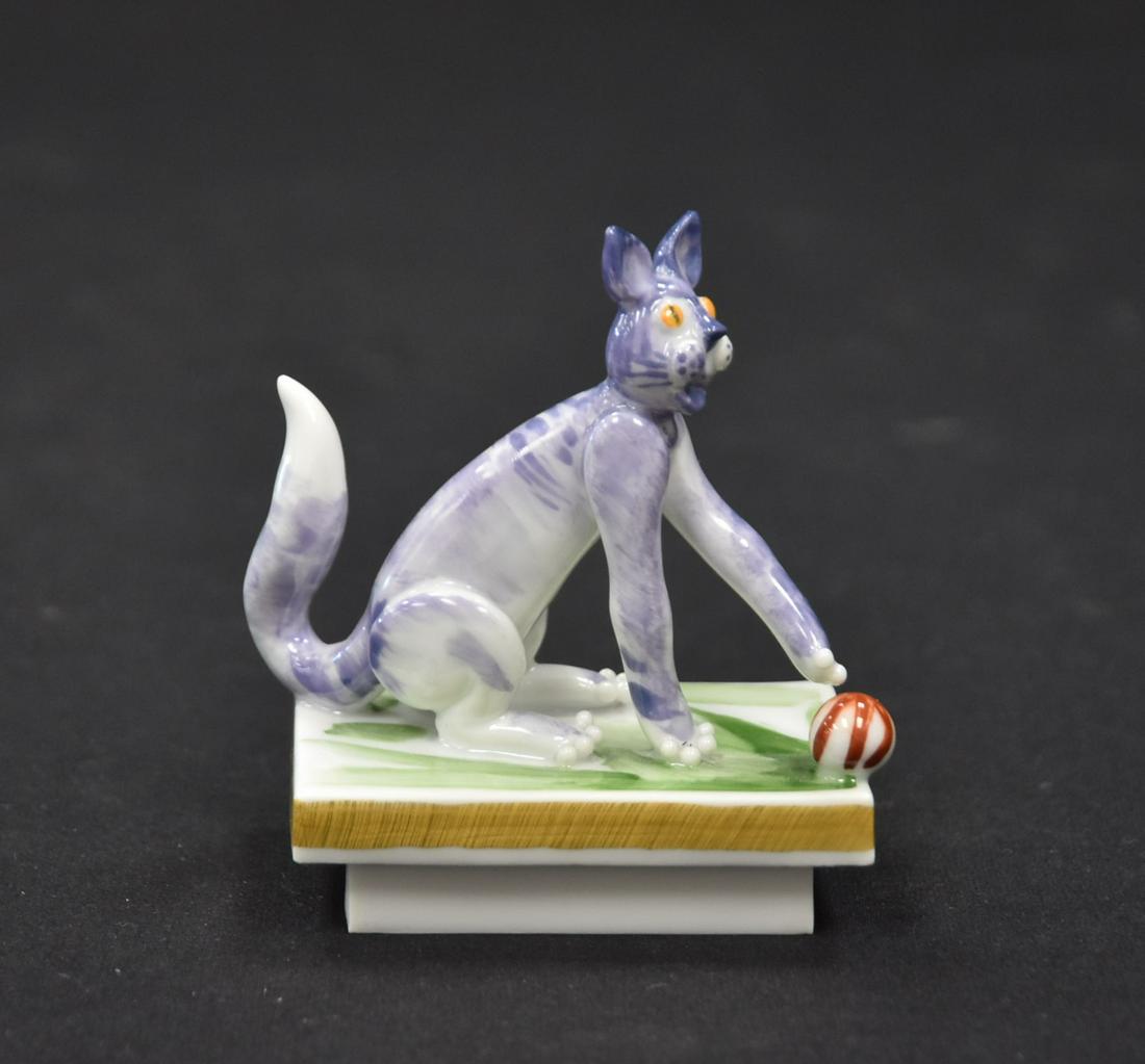 PETER STRANG FOR MEISSEN FUNNY CAT WITH BALL: MEISSEN PORCELAIN MODEL OF FUNNY CAT WITH BALL BY PETER STRANG , No. 83302 - 3" x 1 1/2" x 3"
