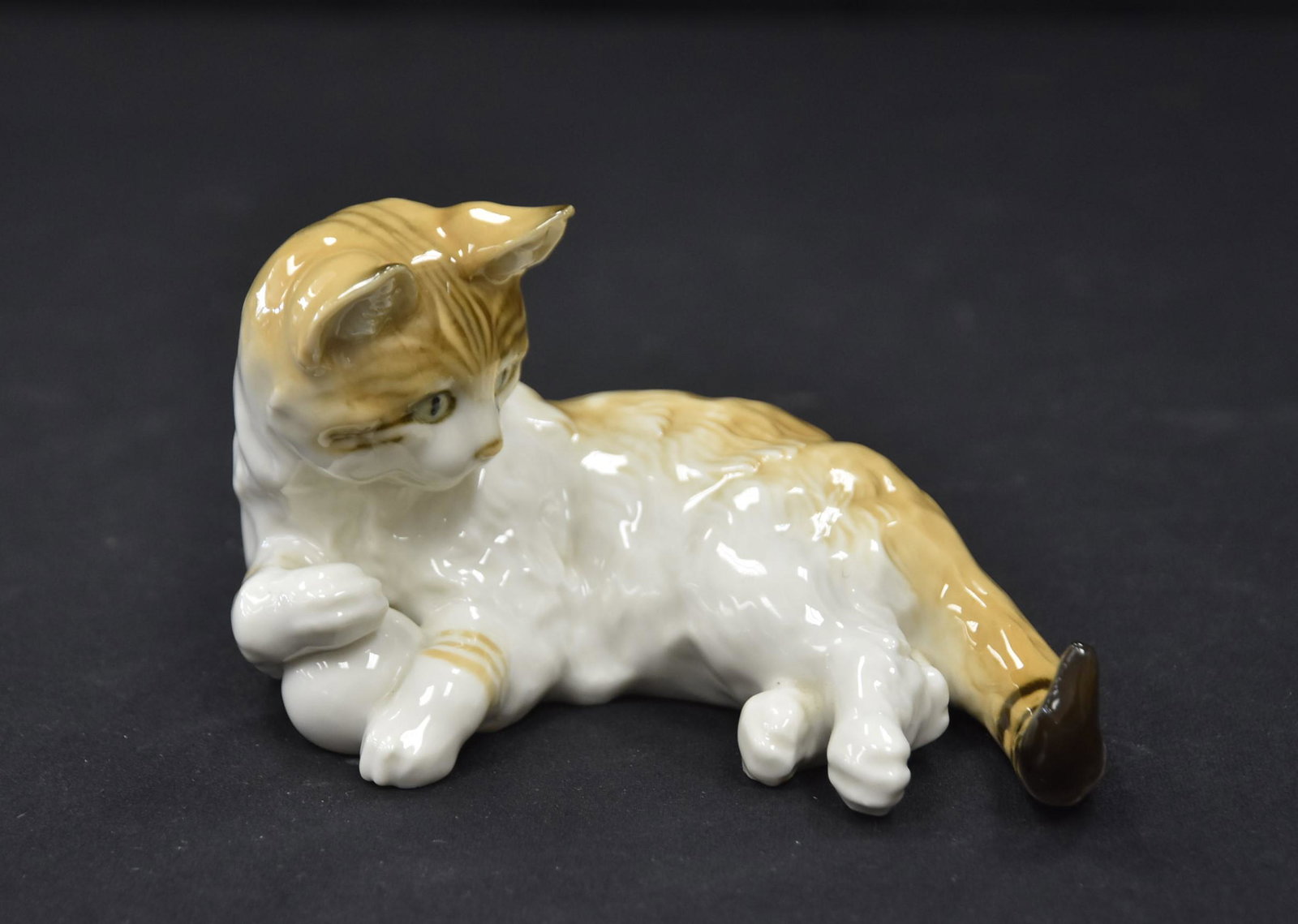 HUTSCHENREUTHER HONEY & WHITE RECLINING CAT: HUTSCHENREUTHER PORCELAIN MODEL OF HONEY & WHITE CAT LAYING DOWN, MODEL NUMBER 2053- 6" x 4" x 3 1/2"