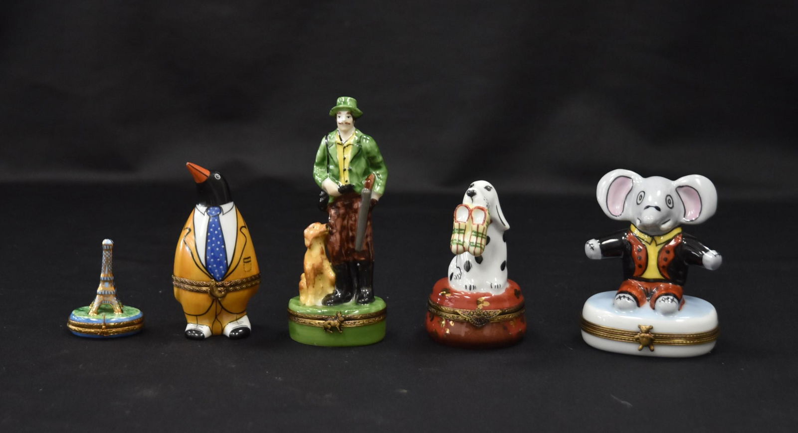 (5) MINIATURE LIMOGES ENAMEL BOXES: (5) MINIATURE LIMOGES ENAMEL ANIMAL HINGED BOXES INCLUDING PENGUIN , ELEPHANT , DOG , MAN & EIFFEL TOWER - 1 3/4" x 4 1/2"
