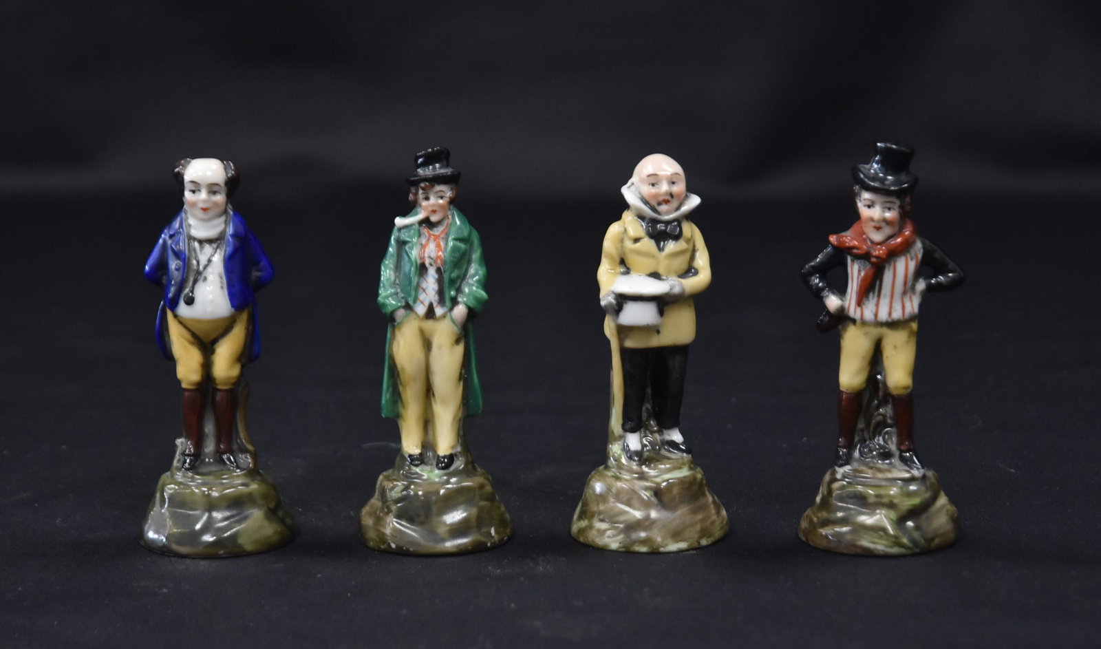 (4) MINIATURE PORCELAIN MEN: 1 3/4" x 3 1/2"