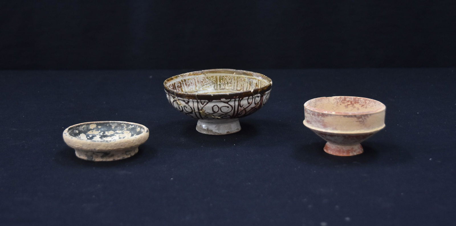 (3) ANCIENT PERSIAN POTTERY BOWLS: LARGEST IS 5" x 2"