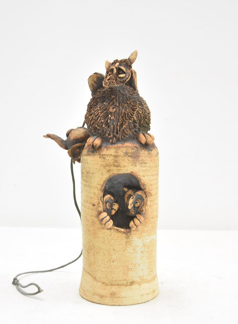 ORIGINAL TODD WARNER HANGING OWL CHIME: EARLY TODD WARNER HANGING OWL CHIME WITH SMALLER OWL HANGING ON ROPE ABOVE THE BELL ; SIGNED TODD WARNER 1976 ( ONE EAR MISSING & CHIP ON WING ; SMALL OWL HAS 2 EARS MISSING ) ; CHIME IS 4 1/2" x 13"