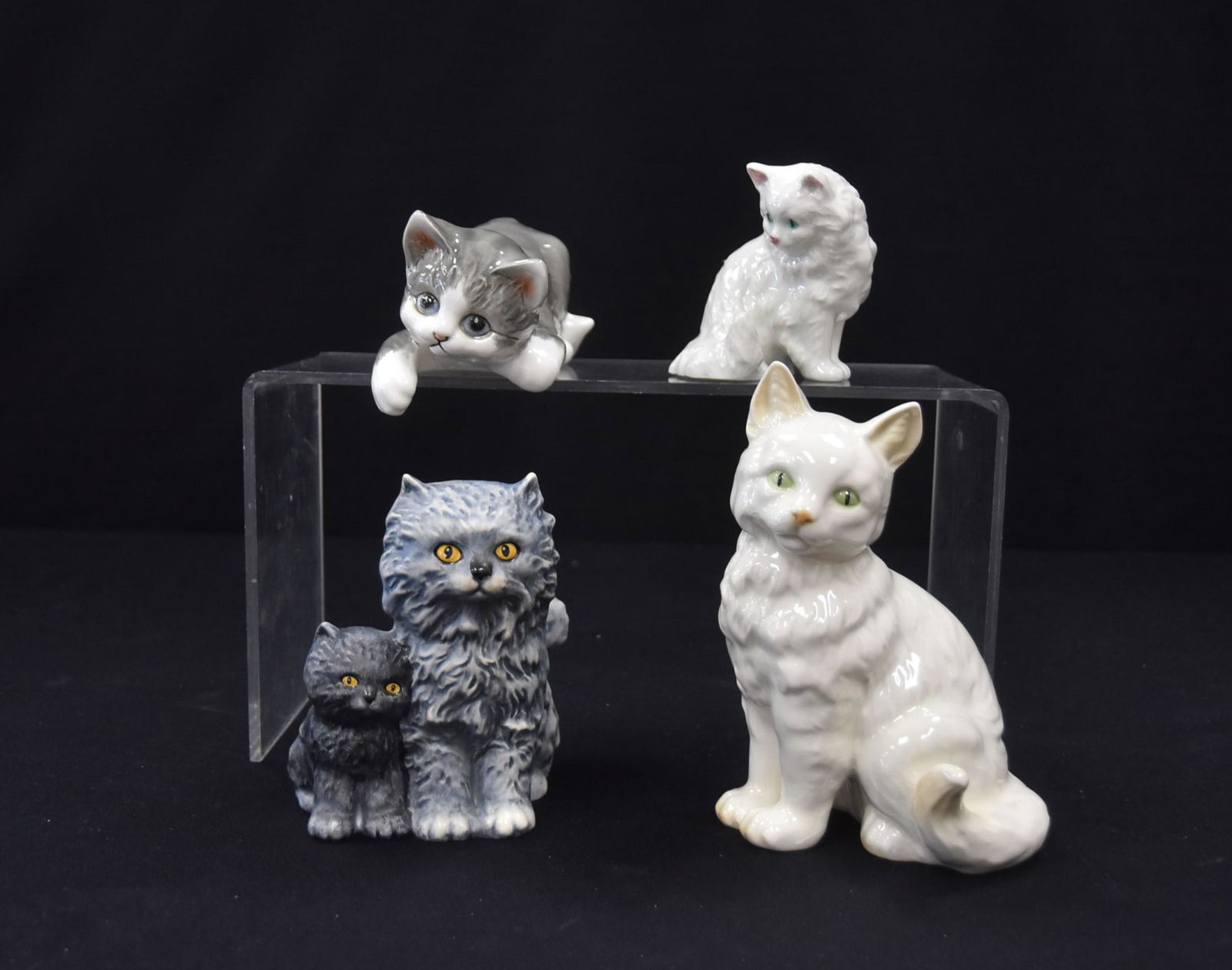 (4) GOEBEL PORCELAIN CAT MODELS: GOEBEL PORCELAIN SEATED PAIR OF CATS , 31-008-12 / GOEBEL GREY & WHITE CAT , 31-071-14 / GOEBEL ALL WHITE SEATED CAT , CK - 20/ GOEBEL CAT , 31-00812 - LARGEST IS 6 1/2"