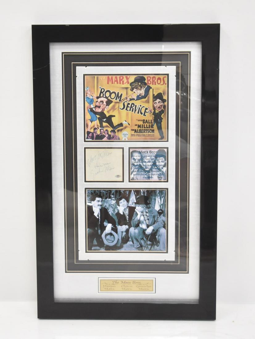 MARX BROTHERS , AUTOGRAPH PHOTO COLLAGE: MARX BROTHERS , PHOTO COLLAGE WITH AUTOGRAPH PLATE CARD SIGNED BY HARPO MARX , CHICO MARX & GROUCHO MARX ,WITH AMERICAN BOARD OF FORENSIC EXAMINERS CERTIFICATE - FRAMED IN PHOTO COLLAGE - 21 1/2" x 35