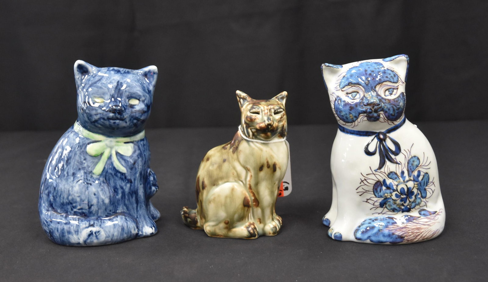 (3) ROYAL COPENHAGEN CATS: ROYAL COPENHAGEN STONEWARE SEATED CAT / LYNX , MODEL 20242 , DESIGNED BY KNUD KYHN - 4" x 4 3/4"/ ROYAL COPENHAGEN ALUMINIA FAIENCE CAT , MODEL 3654 , BY DOREEN MIDDLEBOE- 4" x 6"/ ROYAL COPENHAGEN FA