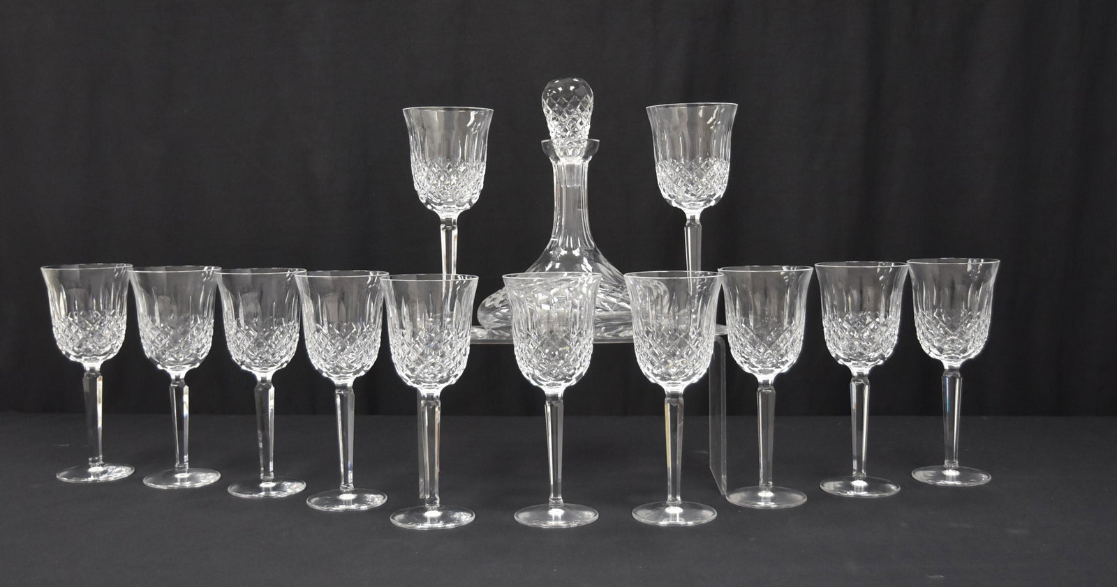 (12) WATERFORD CRYSTAL WINE GLASSES: (12) WATERFORD CRYSTAL STEMWARE GLASSES - 3 1/2" x 8 1/2" / WATERFORD CRYSTAL SHIPS DECANTER (REPLACED TOP)