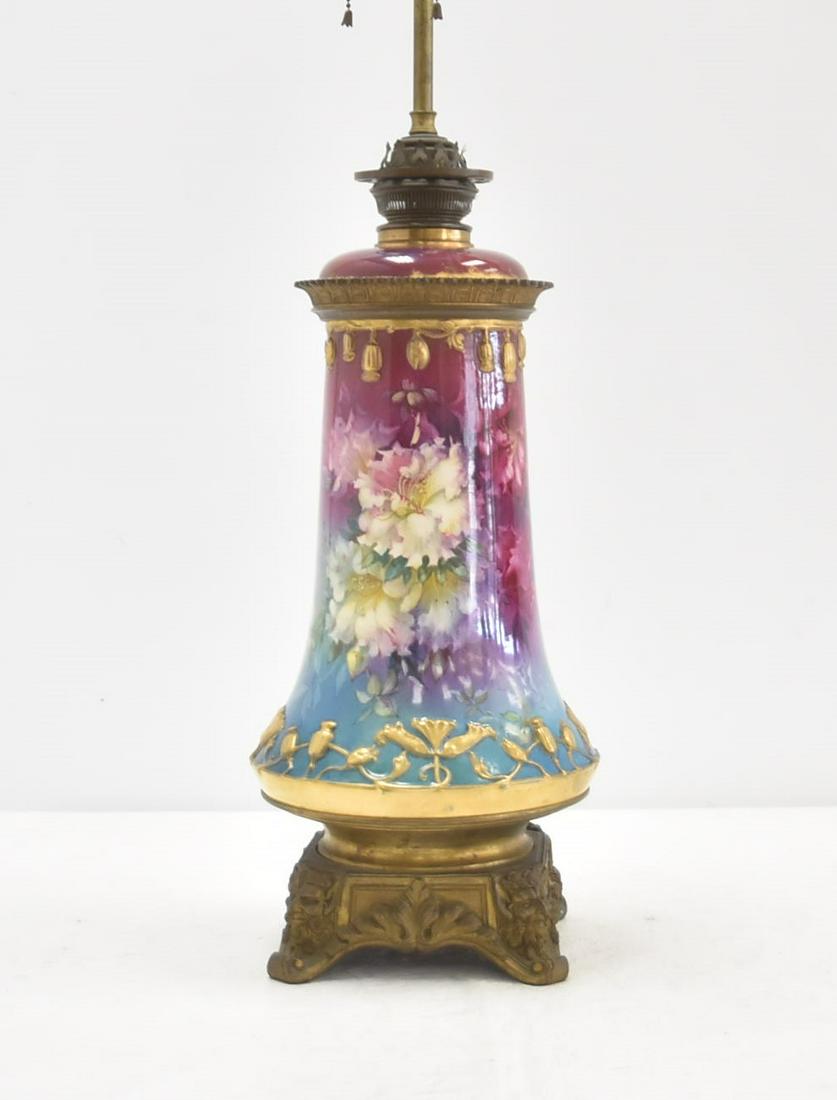 ROYAL BONN PORCELAIN OIL LAMP: ART NOUVEAU STYLE ROYAL BONN CONVERTED OIL LAMP ; ELECTRIFIED WITH BRONZE MOUNTS - 8" x 32" OVERALL (SMALL REPAIR ON TOP)