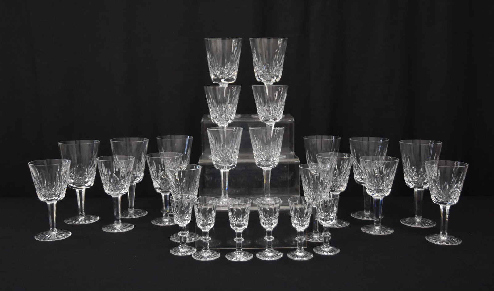 WATERFORD "LISMORE" PATTERN STEMWARE: (26)pc WATERFORD LISMORE PATTERN STEMWARE GLASSES INCLUDING (8) WATER GLASS, (8) WINE GLASS , (4) SMALL WINE GLASSES & (6) CORDIAL GLASSES - LARGEST IS 3 1/2" x 7"