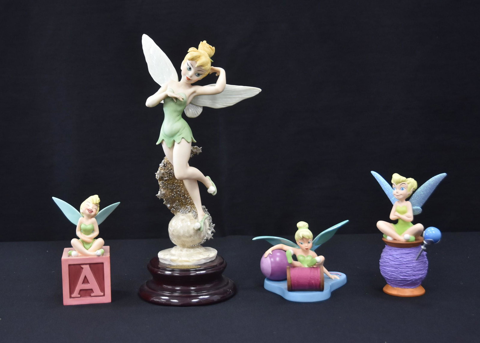 (4)pc PETER PAN TINKER BELL LOT: WDCC WALT DISNEY GIUSEPPE ARMANI TINKERBELL FROM PETER PAN FIGURE - 3 1/2" x 12" / WDCC TINKERBELL LITTLE CHARMER PORCELAIN FIGURINE / A FIREFLY , A PIXIE , AMAZING PORCELAIN FIGURINE / RESIN TINKERBE